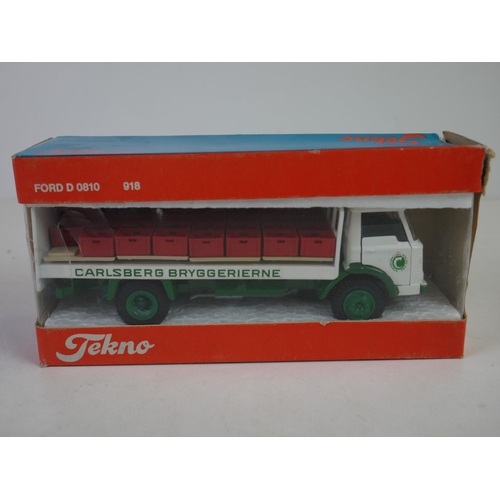 1150 - Four boxed 1/50 Teckno diecast haulage and construction models to include Scania L110, Ford D0810 91... 