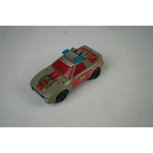 2441 - Seven playworn Hasbro G1 Transformers and Tonka Gobots to include Grimlock, Scourge, Leader 1, Cy-Ki... 