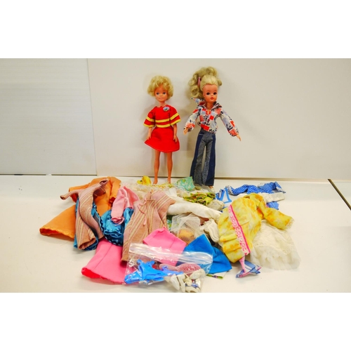 336 - Two original Hong Kong Sindy dolls with clothing and accessories, both appearing vg, with some custo... 