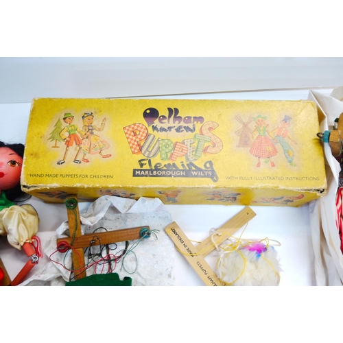 339 - Boxed Pelham Puppet (possibly Gretel), box and puppet is gd condition, plus four playworn Pelham Pup... 