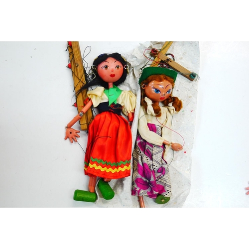 339 - Boxed Pelham Puppet (possibly Gretel), box and puppet is gd condition, plus four playworn Pelham Pup... 