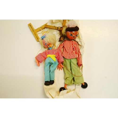 339 - Boxed Pelham Puppet (possibly Gretel), box and puppet is gd condition, plus four playworn Pelham Pup... 