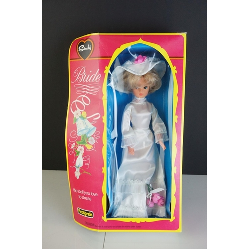 357 - Two original boxed Pedigree Sindy dolls to include Bride 44957 (vg, gd box) and 12GSS14 Auburn in go... 