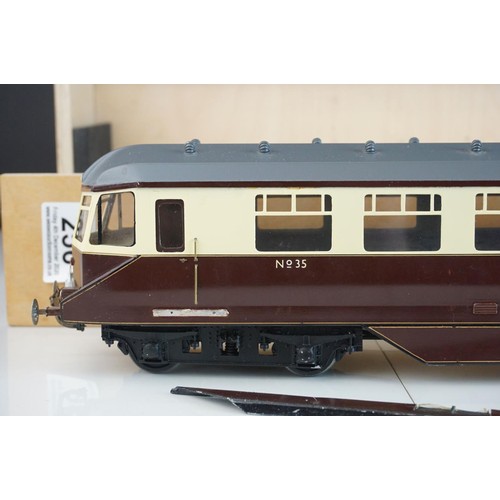 256 - Two built O gauge cast kit GWR coaches in brown / cream livery, contained within custom box, the odd... 