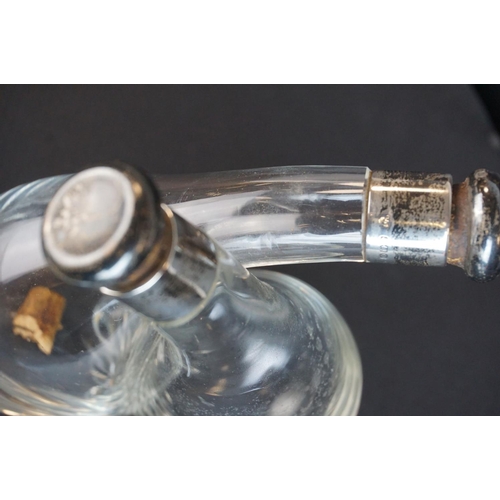 114 - Silver Mounted Glass Cross-over Oil and Vinegar Bottles, with silver mounted original stoppers, Birm... 