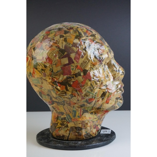 136 - Newspaper / Comic Papier Mache Man's Head on plinth base, 29cms high