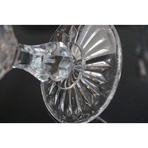 146 - Part suite of moulded and cut glass port and wine glasses, the bowls with spiral decoration (nine wi... 
