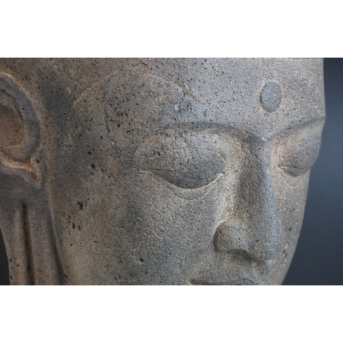 155 - Large Composite Stone Buddha Head mounted on a Wooden Block Base, total height 49cms
