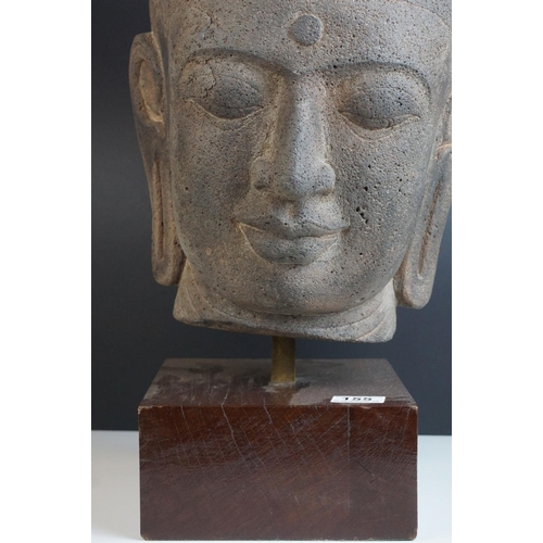 155 - Large Composite Stone Buddha Head mounted on a Wooden Block Base, total height 49cms