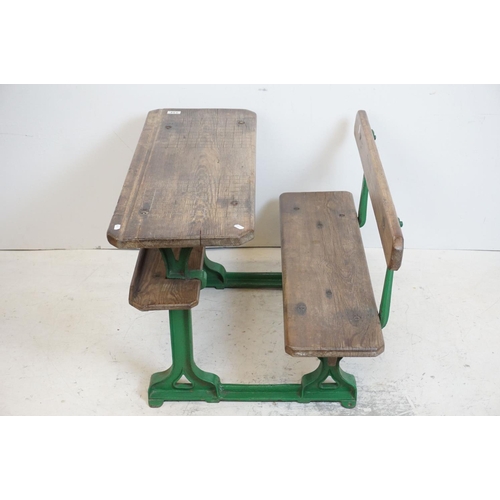 134 - Late 19th / Early 20th century Child's Pine combined Double Desk and Seat, with a green painted cast... 