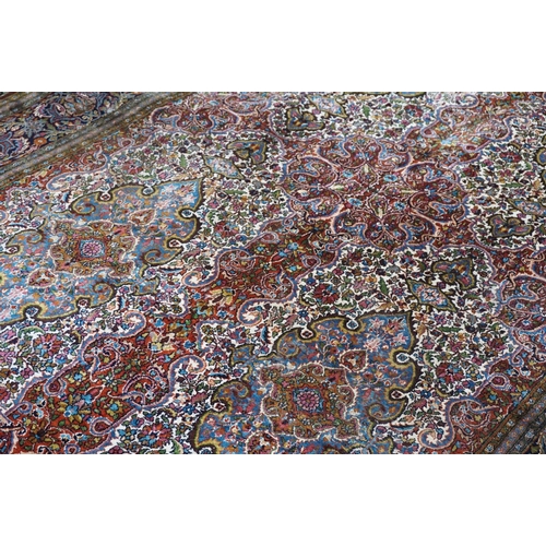 890 - Eastern style Silk Rug, the stylised pattern including foliage, 306cms x 183cms