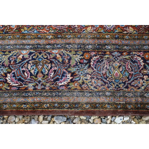 890 - Eastern style Silk Rug, the stylised pattern including foliage, 306cms x 183cms
