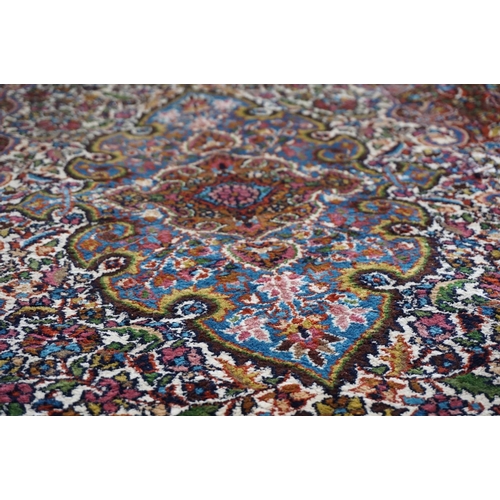 890 - Eastern style Silk Rug, the stylised pattern including foliage, 306cms x 183cms