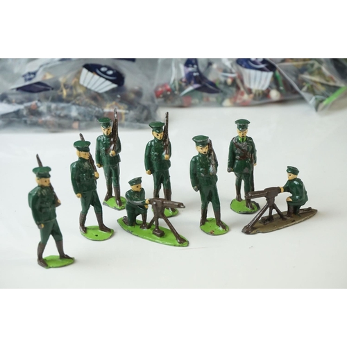 19 - Collection of mid-20th Century figures and soldiers, to include Britains, various regiments, militar... 