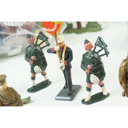 19 - Collection of mid-20th Century figures and soldiers, to include Britains, various regiments, militar... 