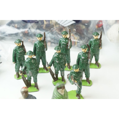 19 - Collection of mid-20th Century figures and soldiers, to include Britains, various regiments, militar... 