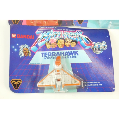 24 - Three carded Bandai Terrahawks figures to include Battlehawk, Terrahawk and Lieutenant Hawkeye. Plus... 