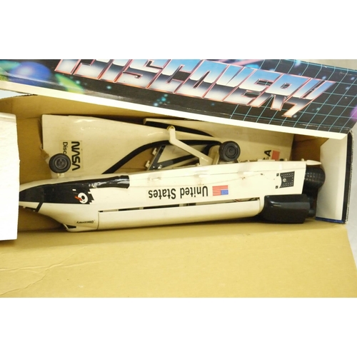 29 - Boxed Saturn robot, showing signs of playwear and missing sticker, plus boxed Discovery Shuttle and ... 