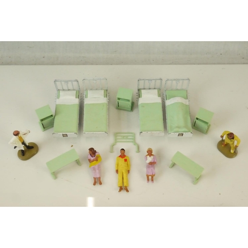 35 - Quantity of loose Britains Hospital figures and accessories, plus 4 x Ensign Limited coloured lanter... 