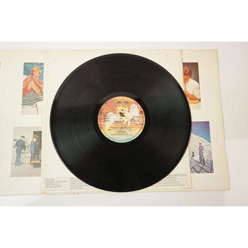 108 - Vinyl - Led Zeppelin Presence (Swan Song SSK 59402).  Sleeve & Vinyl VG