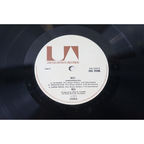 185 - Vinyl - NEU! (UAS 29396) laminated sleeve needs reglue to top, feelable mark to track 1 on side B ot... 