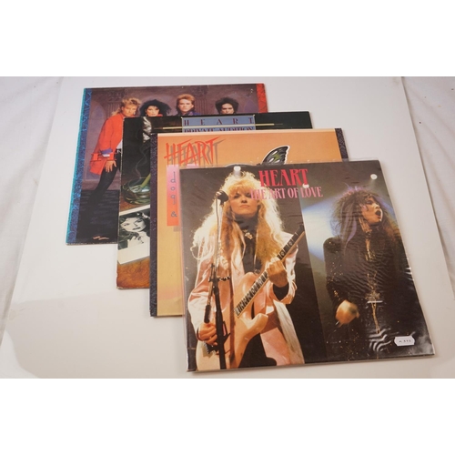 32 - Vinyl - Heart 9 LP's, 3 picture discs, and one 12 inch single.  LP's include The Art Of Love, Privat... 