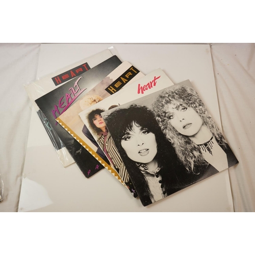 32 - Vinyl - Heart 9 LP's, 3 picture discs, and one 12 inch single.  LP's include The Art Of Love, Privat... 