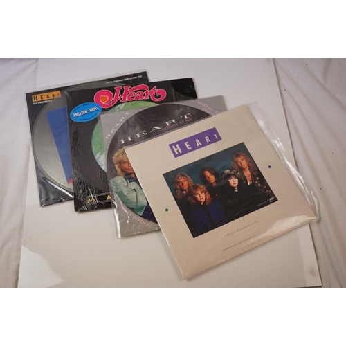 32 - Vinyl - Heart 9 LP's, 3 picture discs, and one 12 inch single.  LP's include The Art Of Love, Privat... 