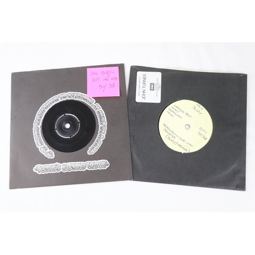 382 - .   IAN DURY AND THE BLOCKHEADS - 2 RARE UK TEST PRESSING SINGLES.  1. HIT ME WITH YOUR RHYTHM STICK... 