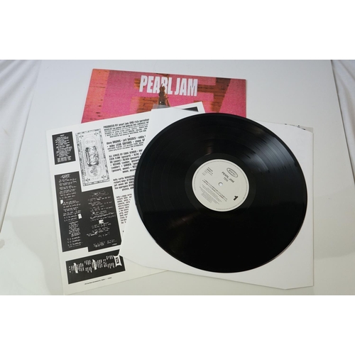 52 - Vinyl - Pearl Jam TEN (EPIC 468884) with printed inner lyric sheet.  Sleeve, Inner, and Vinyl EX