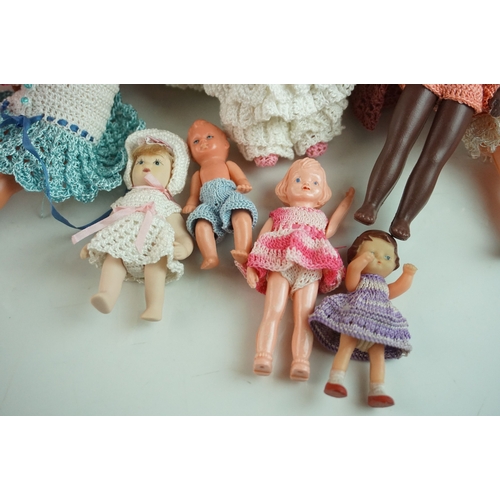 13 - Collection of 30 small dolls mainly celluloid & plastic examples from the mid 20th C