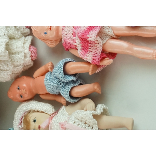 13 - Collection of 30 small dolls mainly celluloid & plastic examples from the mid 20th C