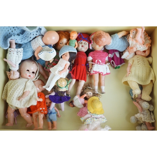 13 - Collection of 30 small dolls mainly celluloid & plastic examples from the mid 20th C