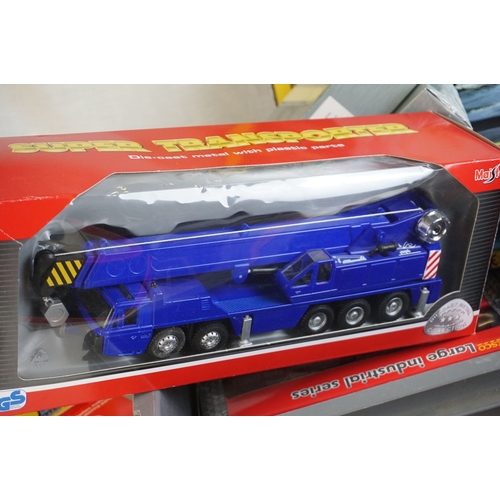 41 - 22 X Boxed, carded and cased diecast construction and emergency services models to include 7 x Tesco... 