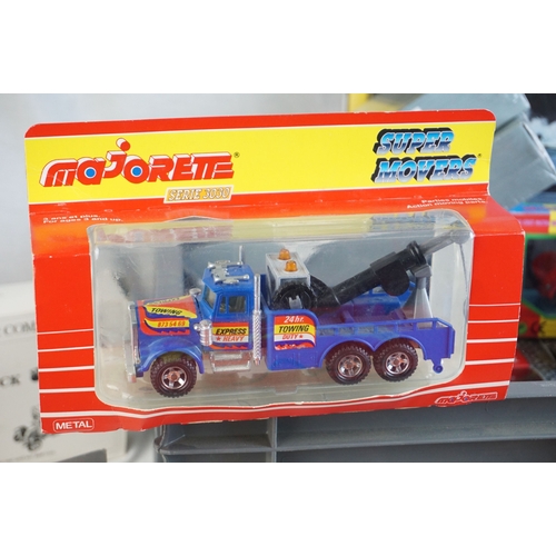 41 - 22 X Boxed, carded and cased diecast construction and emergency services models to include 7 x Tesco... 