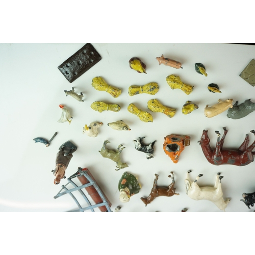 61 - Quantity of mid 20th C metal farm figures, animals and accessories to include Britains, Hornby etc