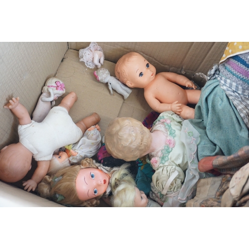 68 - Quantity of various vintage dolls to include cloth, plastic and china headed, condition varies throu... 