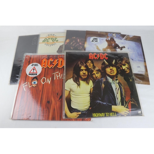 269 - Vinyl - 7 AC/DC LPs to include If You Want Blood, High Voltage , Back In Black, Highway To Hell, Fli... 