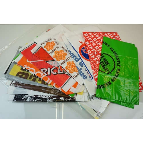 281 - Music Collectables - Approximately 55 record shop carrier bags