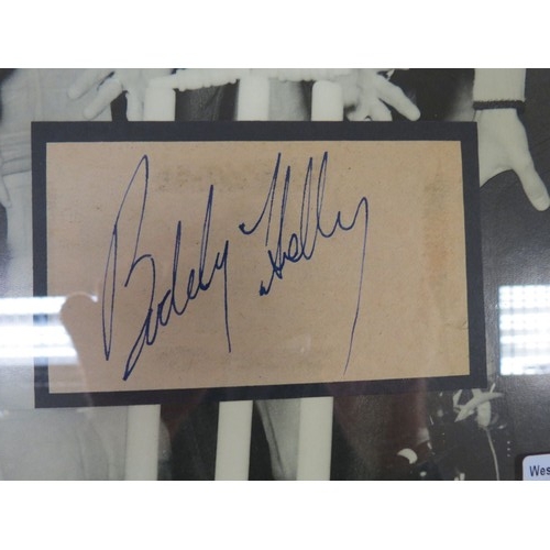 451 - Music Autograph - Clear pen autograph of Buddy Holly on a peice of late 1950s newspaper mounted with... 