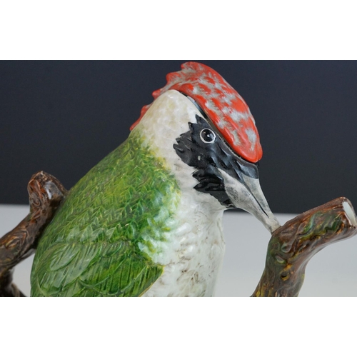 1 - A Beswick Green Woodpecker figure impressed number 1219 green paper label together with a  Royal Sta... 