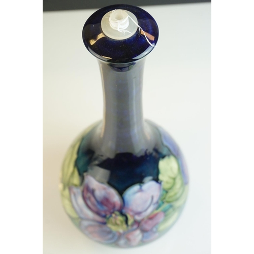 10 - Moorcroft Lamp Base in the Clematis pattern on a blue ground, Moorcroft signature and impressed ' Mo... 