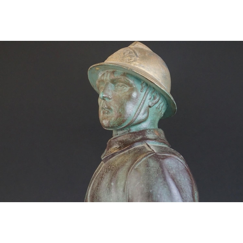102 - Patinated Metal Model of a Fireman on a Marble base, 44cms high