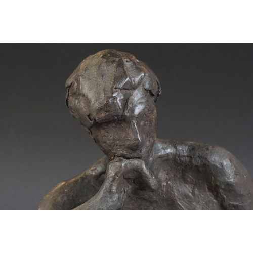130 - Contemporary sculpture of a seated naked woman raised on a wooden plinth by Ivor Plummer, 31cms long