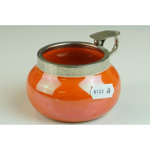 14 - Moorcroft Orange Lustre Ashtray with Silver Plated Mounts, 6.5cms high