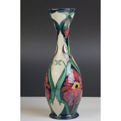 154 - Boxed Moorcroft Pottery Vase in the Burslem Poppy pattern, designed and signed by Rachel Bishop and ... 