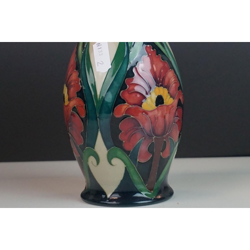 154 - Boxed Moorcroft Pottery Vase in the Burslem Poppy pattern, designed and signed by Rachel Bishop and ... 