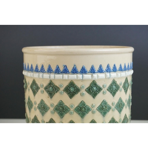 17 - Doulton Lambeth Stoneware Jardiniere / Planter, decorated in relief with blue and green motifs on a ... 