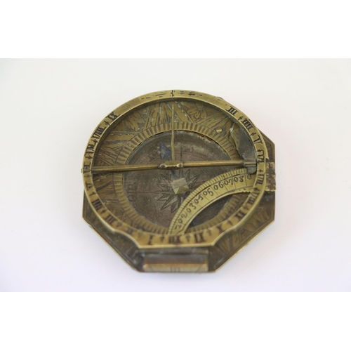 185 - Early 18th century pocket combination compass sundial by L. Grafs, the octagonal brass case with cir... 