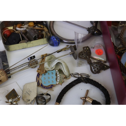 191 - A box of mixed collectables to include Albert chains, vintage costume jewellery and hat pins.